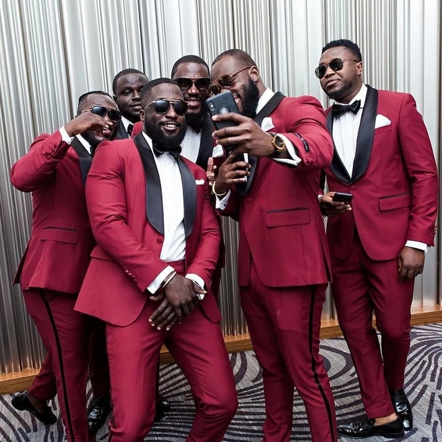 red groomsmen suits